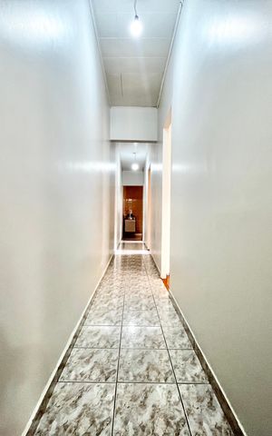 Casa à venda com 125m², 3 quartos e 2 vagas Casa à venda com 125m², 3 quartos e 2 vagasCorredor