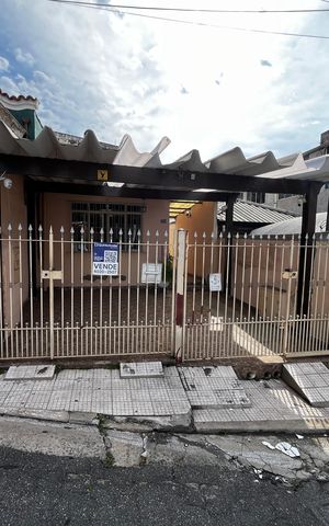 Casa à venda com 125m², 3 quartos e 2 vagas Casa à venda com 125m², 3 quartos e 2 vagasFachada/Placa