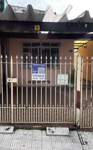 Casa à venda com 125m², 3 quartos e 2 vagas Casa à venda com 125m², 3 quartos e 2 vagasFachada/Placa