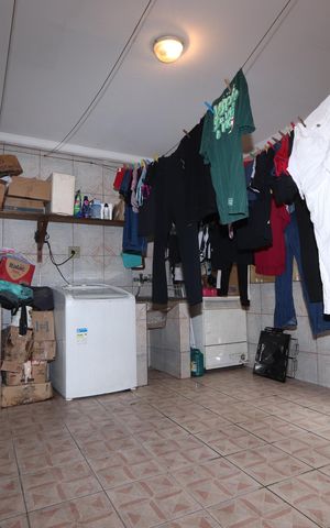 Casa à venda com 172m², 4 quartos e 1 vagaLavanderia