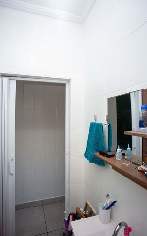 Casa à venda com 180m², 2 quartos e 2 vagasBanheiro Casa 1