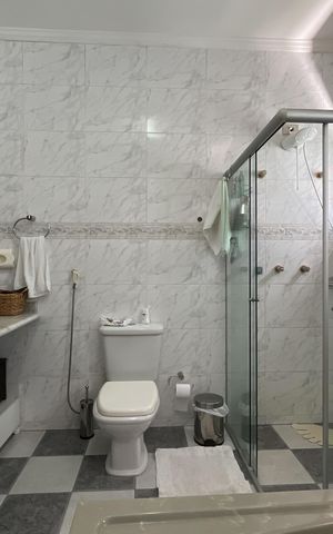 Casa à venda com 420m², 4 quartos e 5 vagasBanheiro Suíte 3