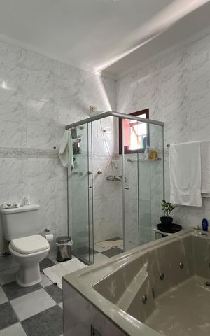 Casa à venda com 420m², 4 quartos e 5 vagasBanheiro Suíte 3