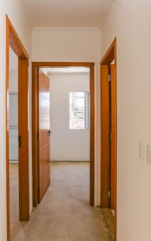 Casa à venda com 84m², 3 quartos e 2 vagas Casa à venda com 84m², 3 quartos e 2 vagasCorredor