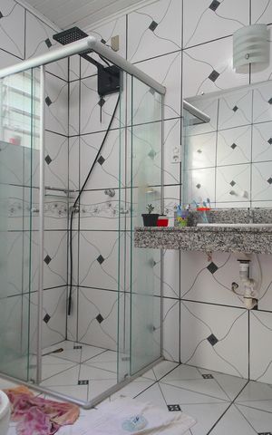 Casa à venda com 132m², 3 quartos e 2 vagasBanheiro