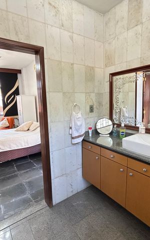 Casa à venda com 900m², 4 quartos e 7 vagasBanheiro da Suíte 3
