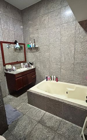 Casa à venda com 900m², 4 quartos e 7 vagasBanheiro da Suíte 1