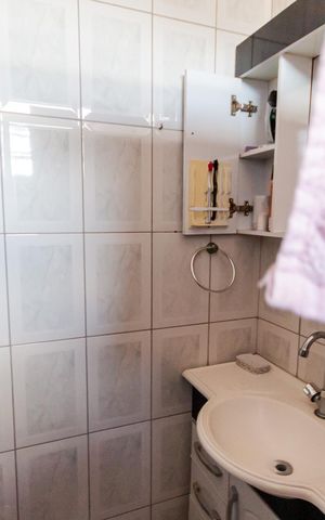 Casa de condomínio à venda com 120m², 2 quartos e 2 vagas Casa de condomínio à venda com 120m², 2 quartos e 2 vagasBanheiro da Suíte 1
