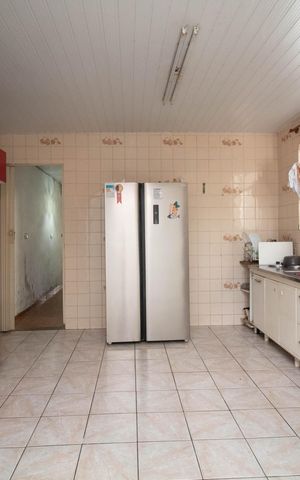 Casa à venda com 110m², 3 quartos e 4 vagas Casa à venda com 110m², 3 quartos e 4 vagasCozinha