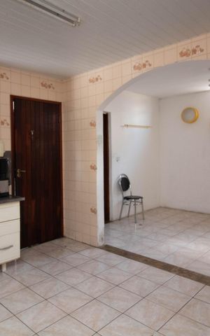 Casa à venda com 110m², 3 quartos e 4 vagas Casa à venda com 110m², 3 quartos e 4 vagasCozinha