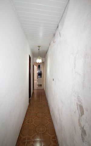 Casa à venda com 110m², 3 quartos e 4 vagas Casa à venda com 110m², 3 quartos e 4 vagasCorredor