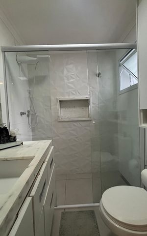 Casa à venda com 136m², 2 quartos e 3 vagas Casa à venda com 136m², 2 quartos e 3 vagasBanheiro da Suíte 2
