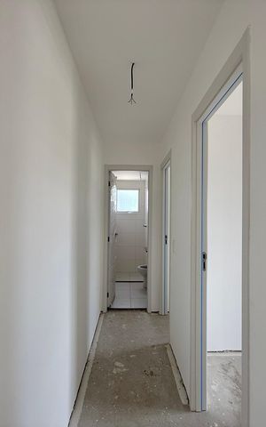 Apartamento à venda com 59m², 2 quartos e 1 vaga Apartamento à venda com 59m², 2 quartos e 1 vagaCorredor Quartos