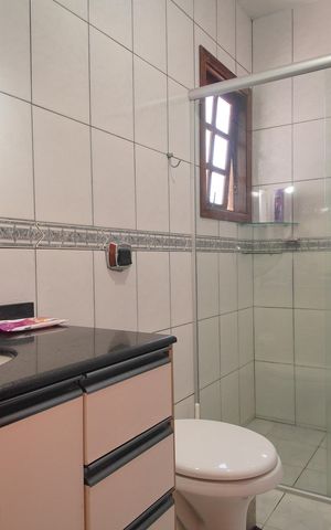 Casa à venda com 300m², 4 quartos e 3 vagasBanheiro 1