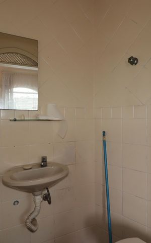 Casa à venda com 250m², 2 quartos e 3 vagasBanheiro de Serviço