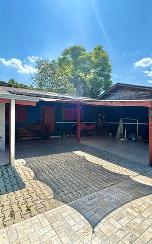 Casa à venda com 113m², 3 quartos e 2 vagas Casa à venda com 113m², 3 quartos e 2 vagasFachada