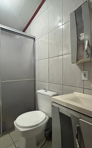 Casa à venda com 113m², 3 quartos e 2 vagas Casa à venda com 113m², 3 quartos e 2 vagasBanheiro