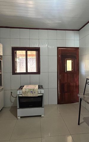 Casa à venda com 113m², 3 quartos e 2 vagas Casa à venda com 113m², 3 quartos e 2 vagasCozinha