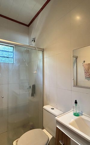 Casa à venda com 113m², 3 quartos e 2 vagas Casa à venda com 113m², 3 quartos e 2 vagasBanheiro