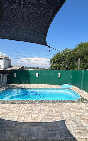 Casa à venda com 113m², 3 quartos e 2 vagas Casa à venda com 113m², 3 quartos e 2 vagasÁrea comum - Piscina