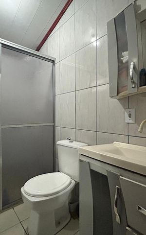 Casa à venda com 113m², 3 quartos e 2 vagas Casa à venda com 113m², 3 quartos e 2 vagasBanheiro