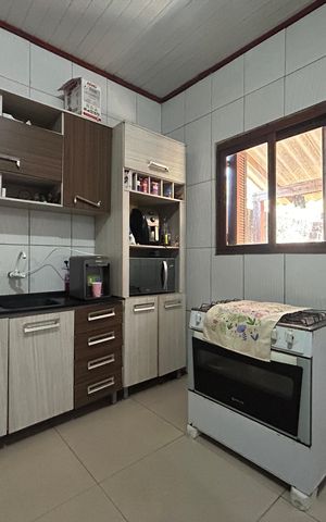 Casa à venda com 113m², 3 quartos e 2 vagas Casa à venda com 113m², 3 quartos e 2 vagasCozinha
