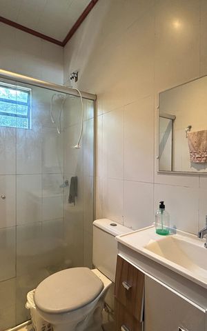 Casa à venda com 113m², 3 quartos e 2 vagas Casa à venda com 113m², 3 quartos e 2 vagasBanheiro