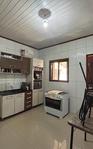 Casa à venda com 113m², 3 quartos e 2 vagas Casa à venda com 113m², 3 quartos e 2 vagasCozinha