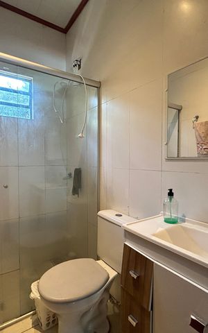 Casa à venda com 113m², 3 quartos e 2 vagas Casa à venda com 113m², 3 quartos e 2 vagasBanheiro