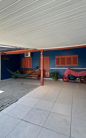 Casa à venda com 113m², 3 quartos e 2 vagas Casa à venda com 113m², 3 quartos e 2 vagasFachada