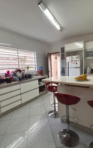 Casa à venda com 114m², 3 quartos e 2 vagas Casa à venda com 114m², 3 quartos e 2 vagasCozinha