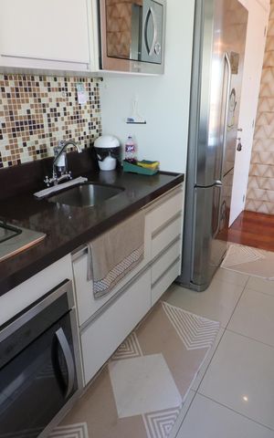 Apartamento à venda com 73m², 2 quartos e 1 vagaCozinha e Área de Serviço