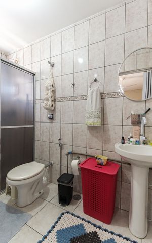 Casa à venda com 120m², 4 quartos e 2 vagas Casa à venda com 120m², 4 quartos e 2 vagasBanheiro da Suíte 1