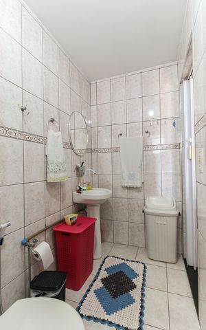 Casa à venda com 120m², 4 quartos e 2 vagas Casa à venda com 120m², 4 quartos e 2 vagasBanheiro da Suíte 1