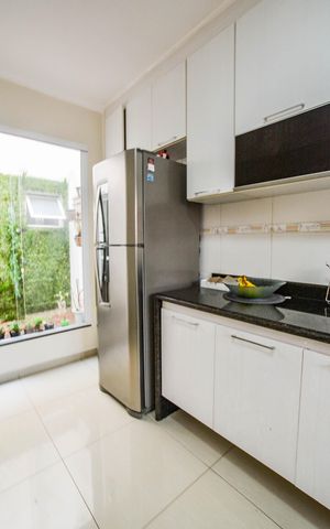 Casa à venda com 131m², 3 quartos e 2 vagas Casa à venda com 131m², 3 quartos e 2 vagasCozinha