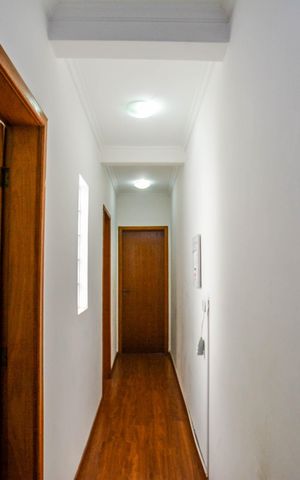 Casa à venda com 131m², 3 quartos e 2 vagas Casa à venda com 131m², 3 quartos e 2 vagasCorredor