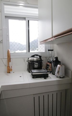Apartamento à venda com 45m², 2 quartos e 1 vagaCozinha e Área de Serviço