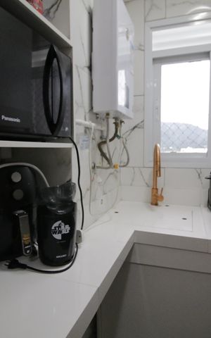 Apartamento à venda com 45m², 2 quartos e 1 vagaCozinha e Área de Serviço
