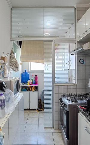 Apartamento à venda com 67m², 3 quartos e 1 vaga Apartamento à venda com 67m², 3 quartos e 1 vagaCozinha e Área de Serviço