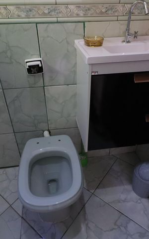 Casa à venda com 300m², 4 quartos e 2 vagasBanheiro da Suíte 1