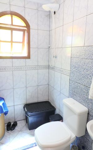 Casa à venda com 300m², 4 quartos e 2 vagasBanheiro 3