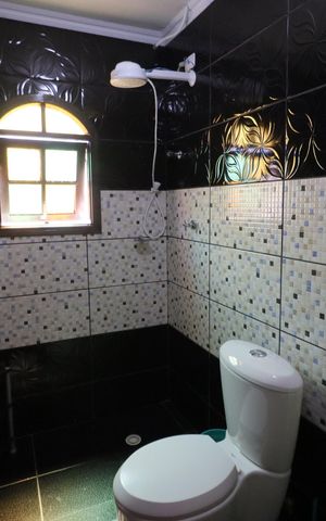 Casa à venda com 300m², 4 quartos e 2 vagasBanheiro da Suíte 2