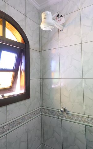 Casa à venda com 300m², 4 quartos e 2 vagasBanheiro da Suíte 1