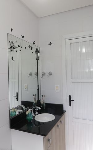Casa à venda com 233m², 5 quartos e 4 vagasBanheiro 2
