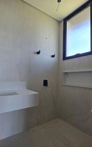 Casa de condomínio à venda com 328m², 4 quartos e 4 vagas