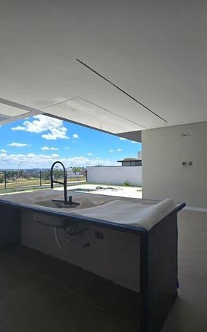 Casa de condomínio à venda com 328m², 4 quartos e 4 vagas