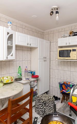 Casa à venda com 100m², 2 quartos e 1 vaga Casa à venda com 100m², 2 quartos e 1 vagaCozinha de serviço fundos
