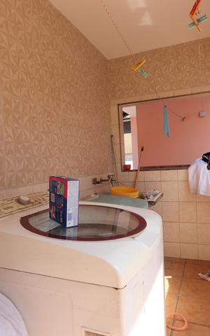 Casa à venda com 200m², 3 quartos e 6 vagasLavanderia