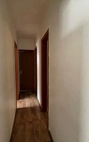 Casa à venda com 103m², 3 quartos e 1 vaga Casa à venda com 103m², 3 quartos e 1 vagaCorredor acesso Dormitórios