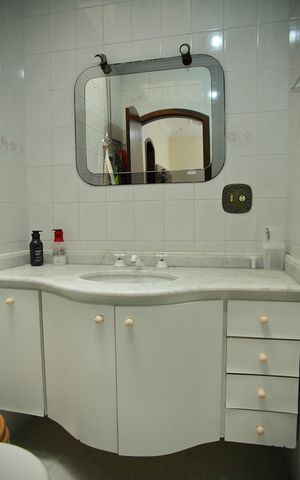 Casa à venda com 241m², 4 quartos e 4 vagasBanheiro Social 
